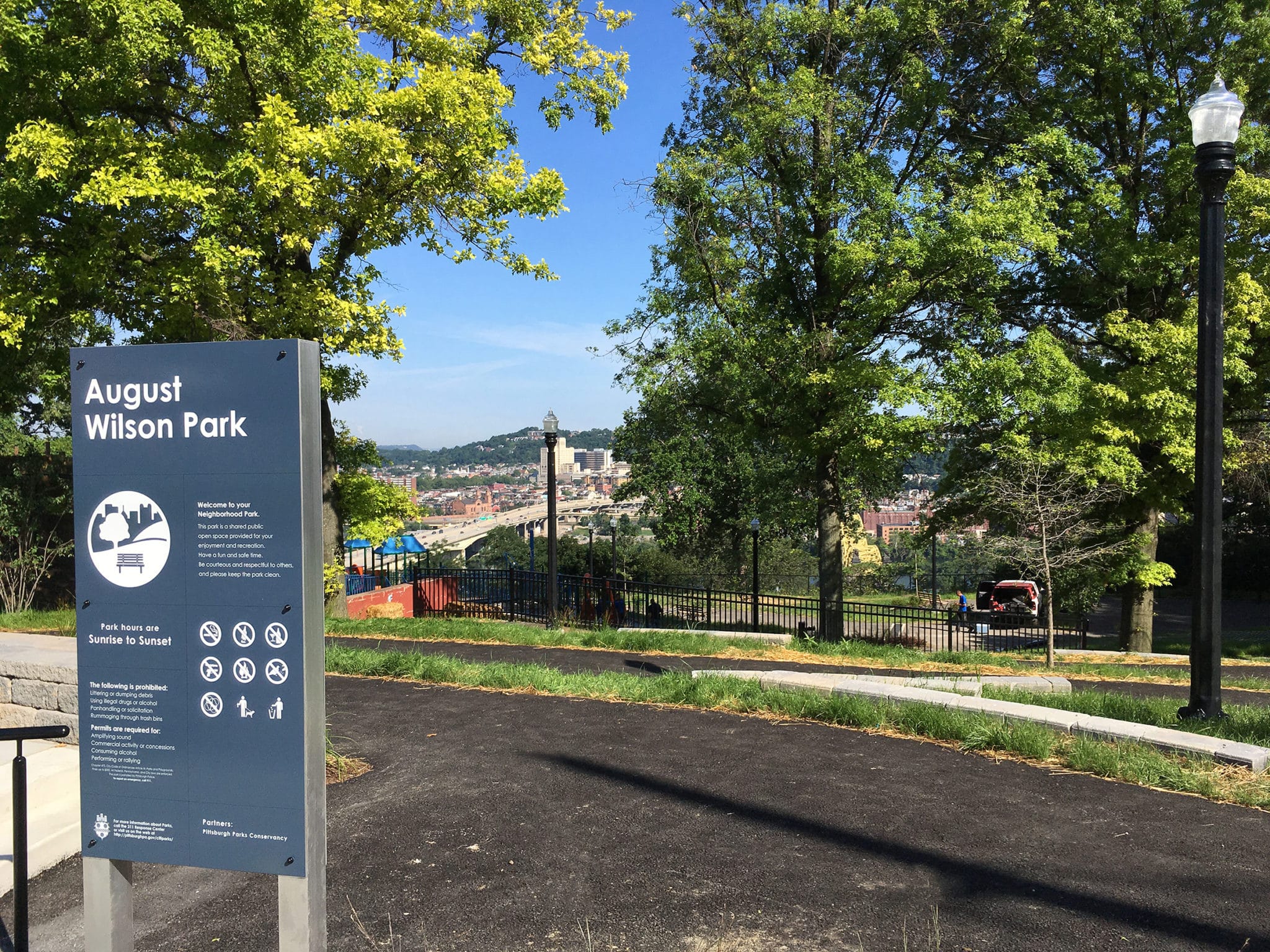 A sign displaying August Wilson Park