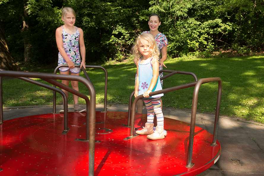 Children playing on a roundabout