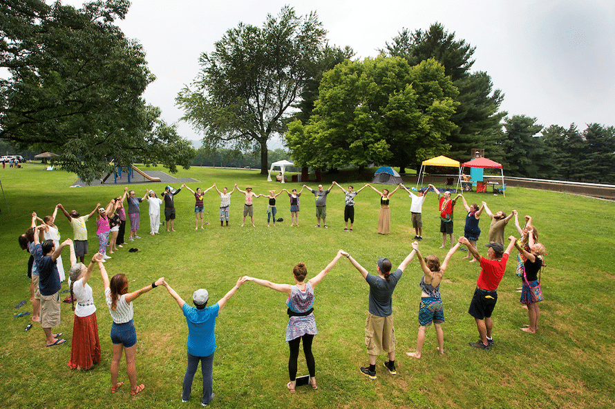 A circle of people holding hands