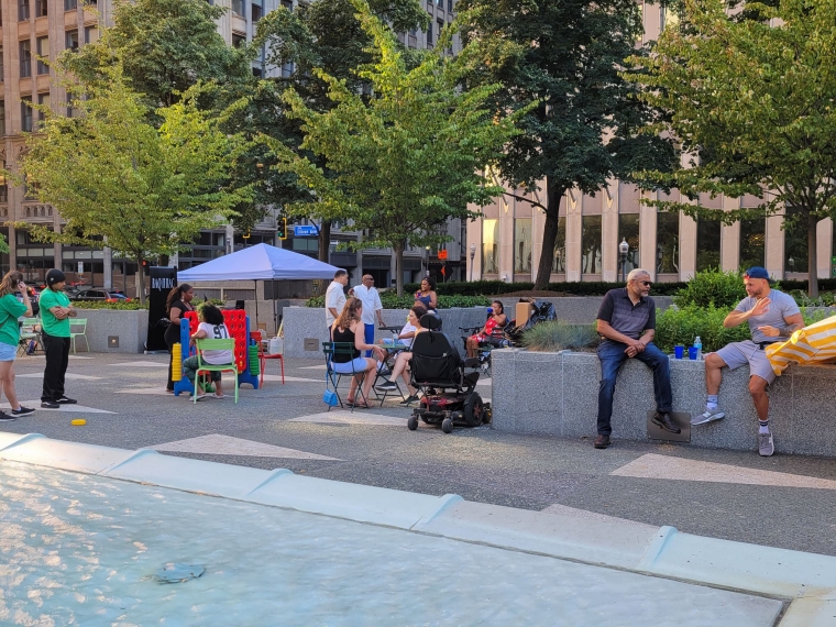 Image of people enjoying Schenley Plaza near the Plaza tent