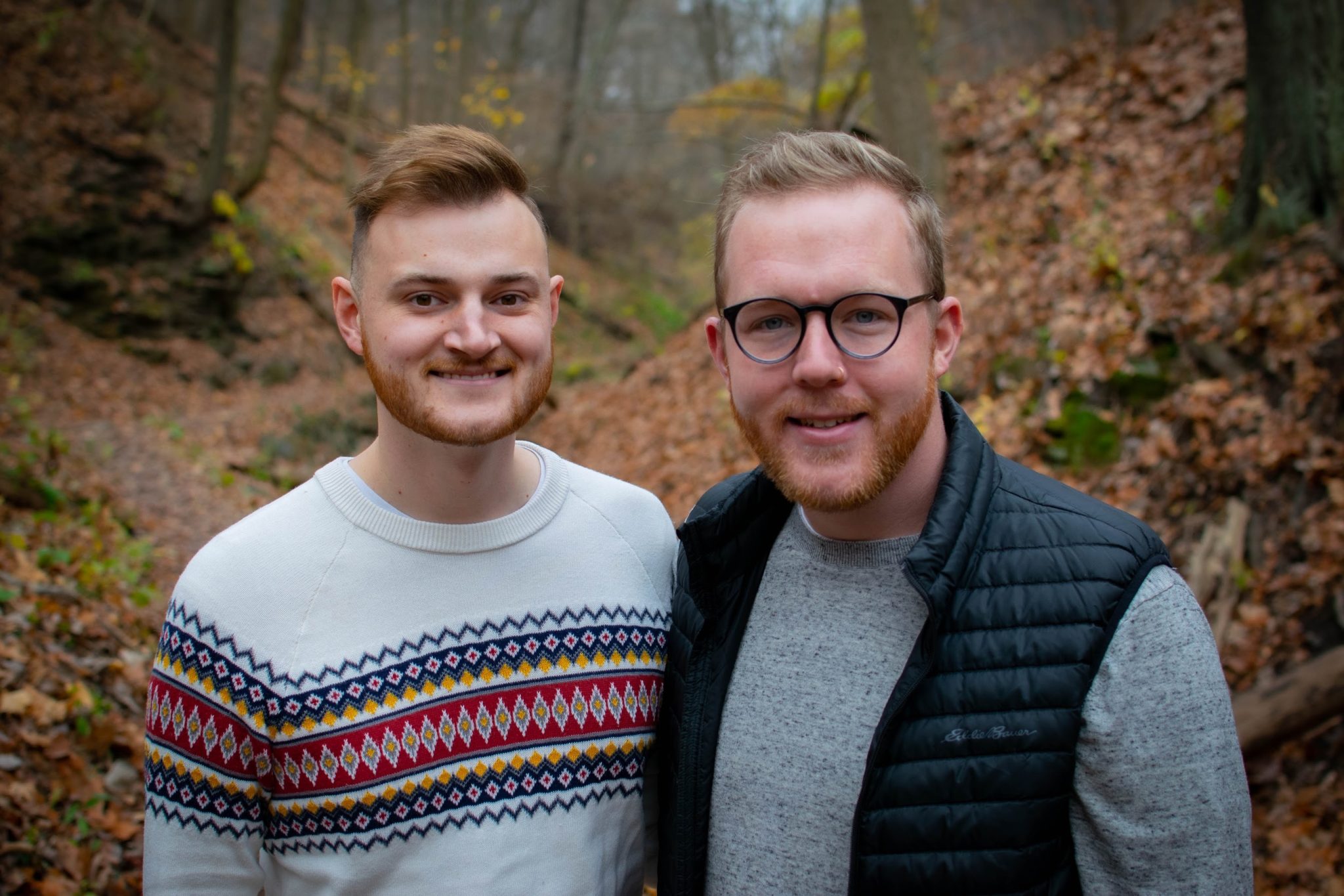 Quintin and Jeff posing together in Schenley Park on an autumn day