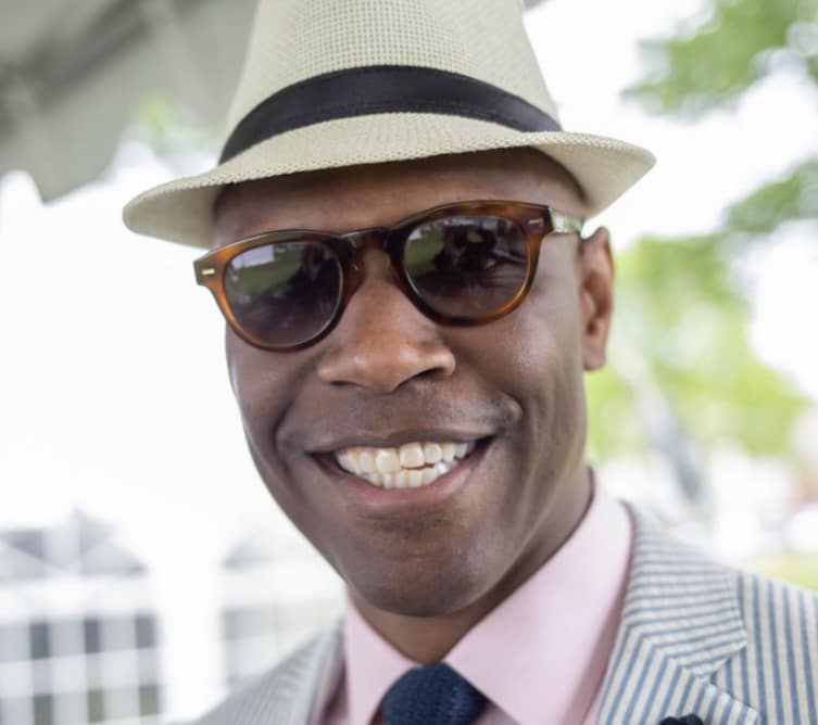 A man at the annual Hat Luncheon event.