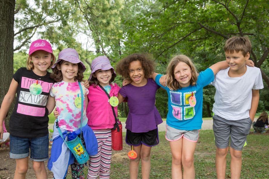 A group of children attending summer camp at the Frick Environmental Center.