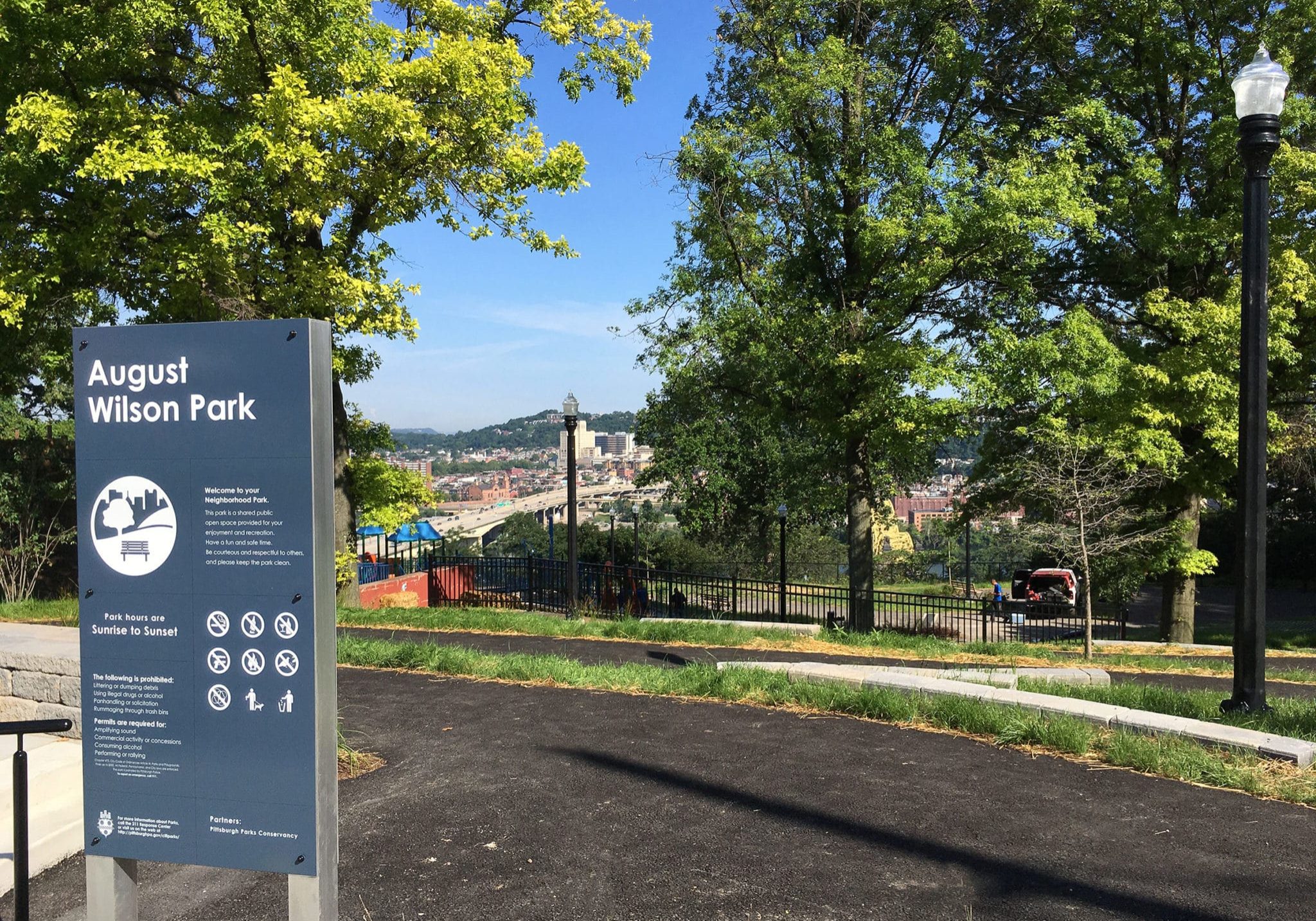 A sign displaying August Wilson Park